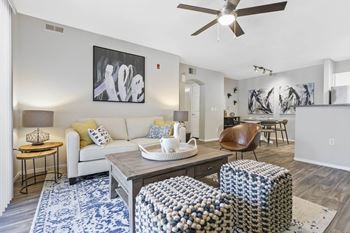 A living room with a couch and a table